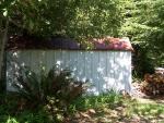 Wood storage shed